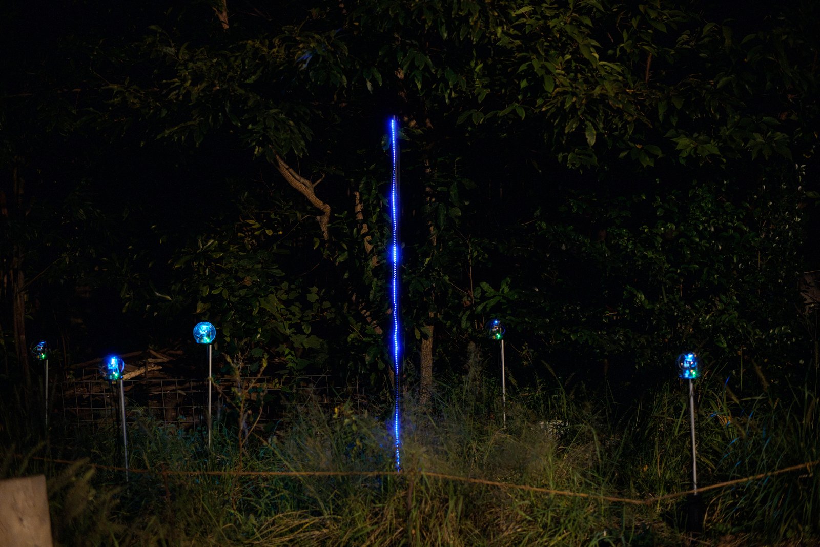 Botanical Intelligence: Moon Edition — LED bar among devices in the grass